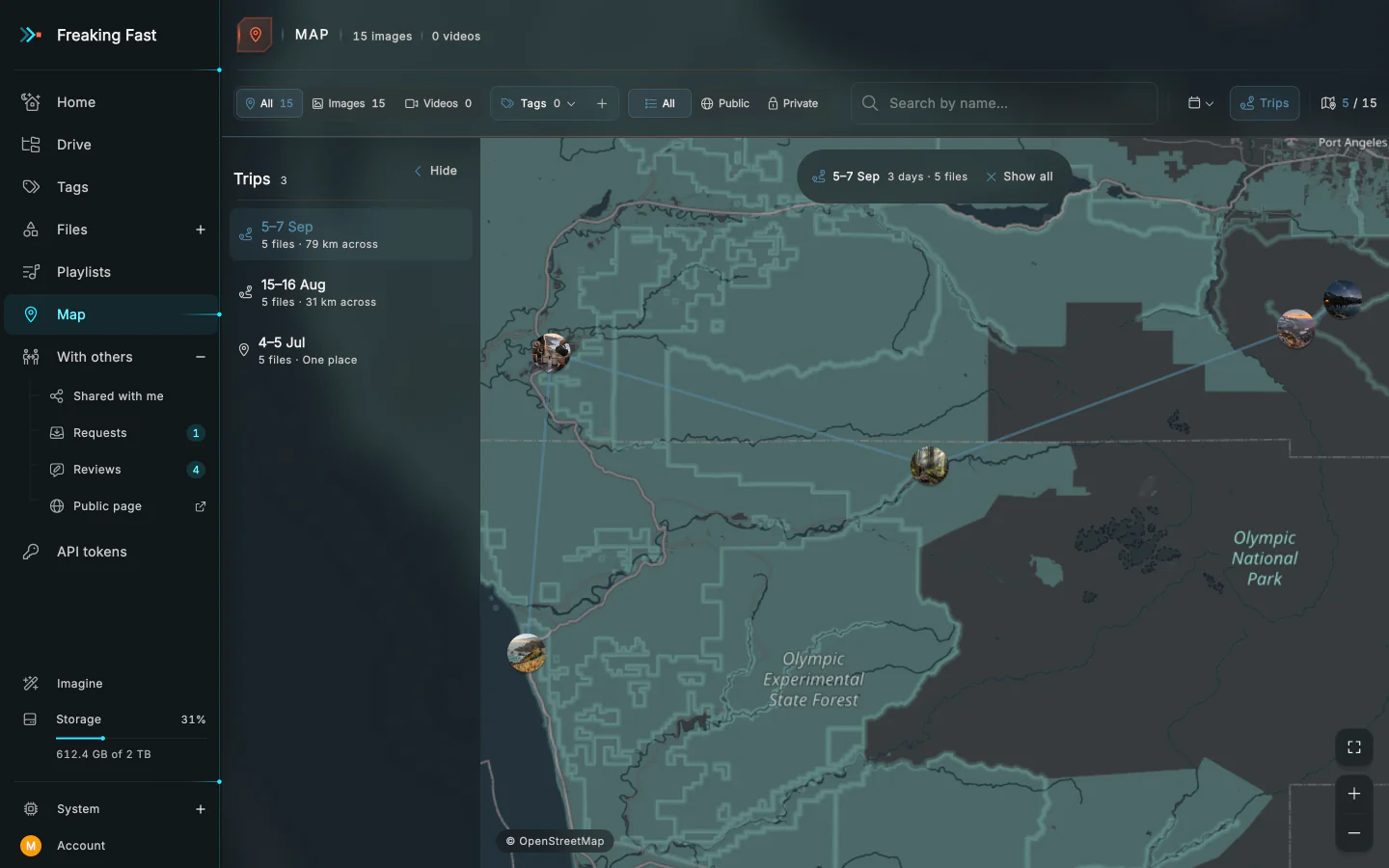 The map with the trips rail open on a weekend on the Olympic Peninsula: photos pinned where they were taken, from the beach to a ridge, joined by the route.